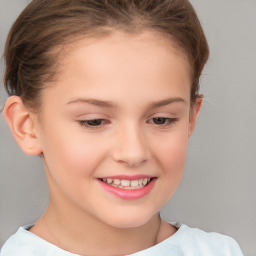 Joyful white child female with short  brown hair and brown eyes