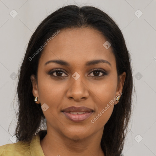 Joyful black young-adult female with long  brown hair and brown eyes