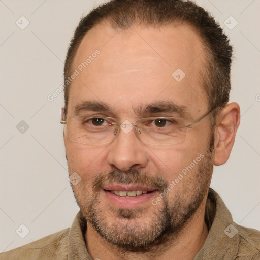 Joyful white adult male with short  brown hair and brown eyes