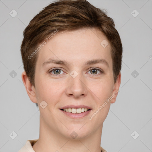 Joyful white young-adult female with short  brown hair and grey eyes