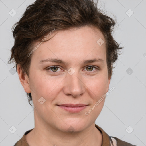 Joyful white young-adult female with medium  brown hair and green eyes