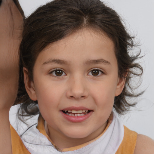 Joyful white child female with medium  brown hair and brown eyes