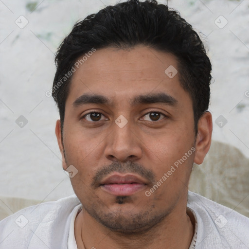 Neutral latino young-adult male with short  black hair and brown eyes