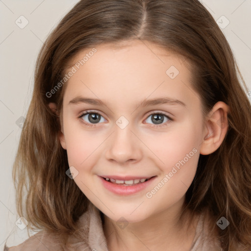 Joyful white child female with long  brown hair and brown eyes