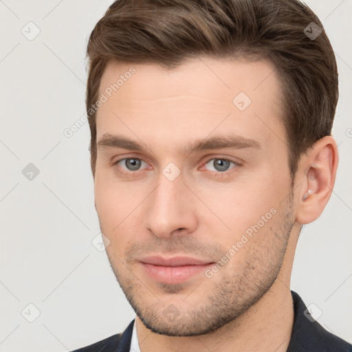 Neutral white young-adult male with short  brown hair and brown eyes