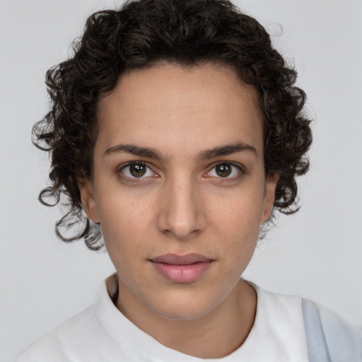 Neutral white young-adult female with short  brown hair and brown eyes