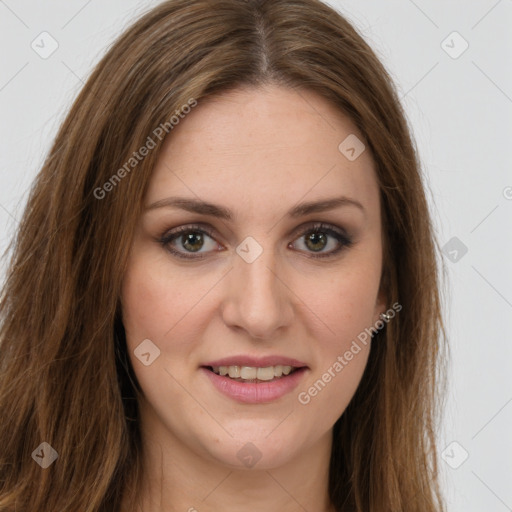 Joyful white young-adult female with long  brown hair and green eyes