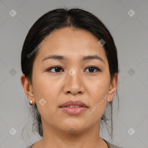 Joyful asian young-adult female with medium  brown hair and brown eyes