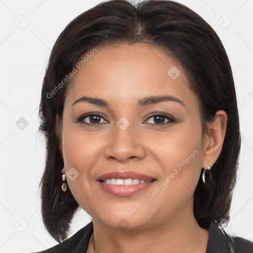 Joyful latino young-adult female with medium  brown hair and brown eyes