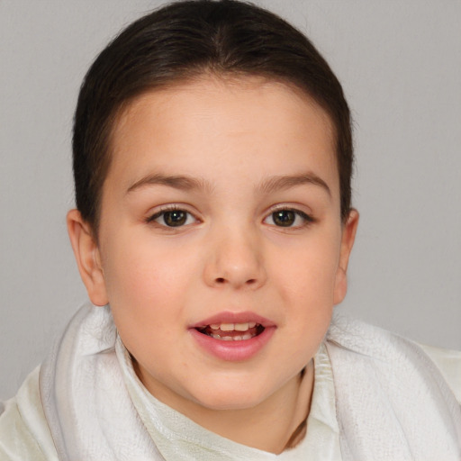 Joyful white child female with medium  brown hair and brown eyes