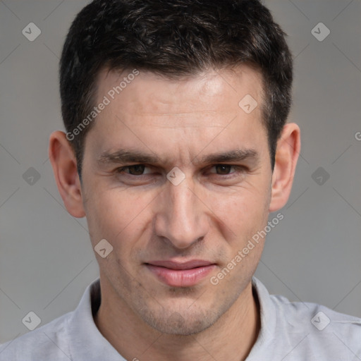 Joyful white adult male with short  brown hair and brown eyes