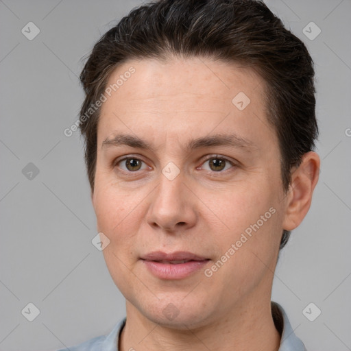 Joyful white adult female with short  brown hair and brown eyes