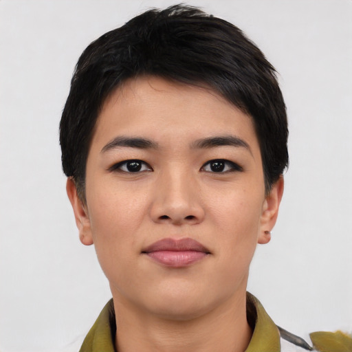 Joyful asian young-adult female with short  black hair and brown eyes