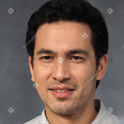 Joyful white adult male with short  black hair and brown eyes