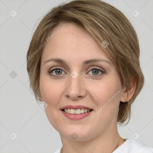 Joyful white young-adult female with medium  brown hair and green eyes