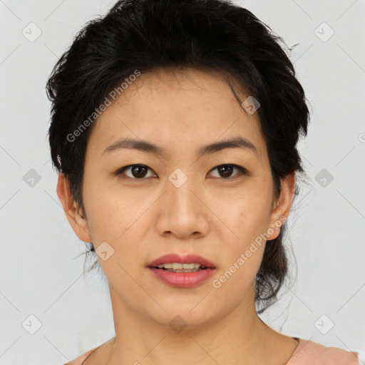 Joyful asian young-adult female with medium  black hair and brown eyes