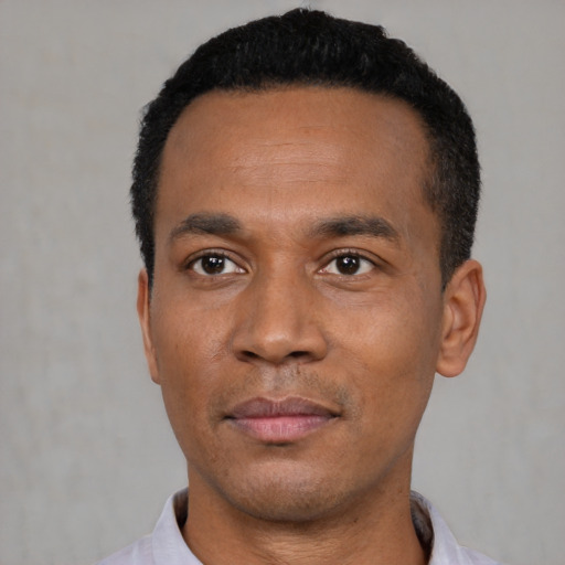 Neutral black young-adult male with short  black hair and brown eyes