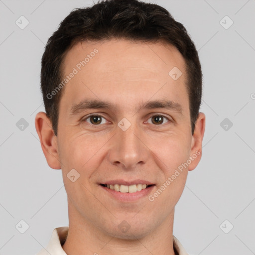 Joyful white young-adult male with short  brown hair and brown eyes