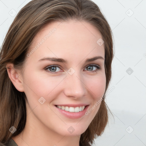 Joyful white young-adult female with long  brown hair and blue eyes