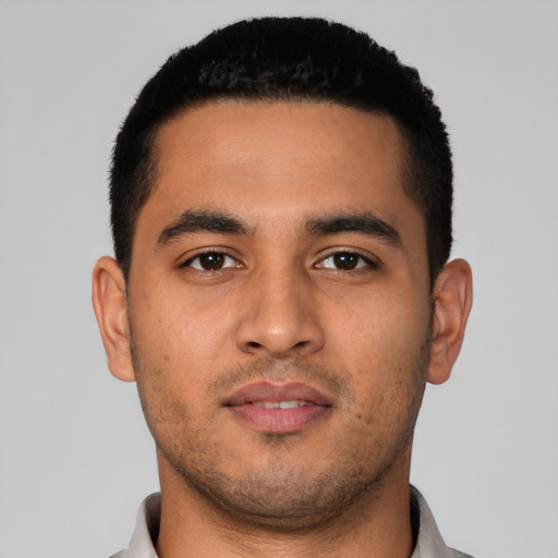 Neutral latino young-adult male with short  black hair and brown eyes