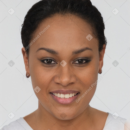 Joyful black young-adult female with short  brown hair and brown eyes