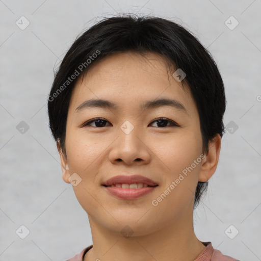 Joyful asian young-adult female with short  black hair and brown eyes