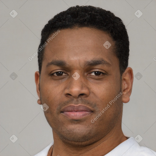 Neutral latino young-adult male with short  black hair and brown eyes