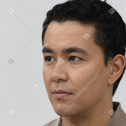 Neutral asian young-adult male with short  black hair and brown eyes