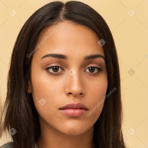 Neutral white young-adult female with long  brown hair and brown eyes