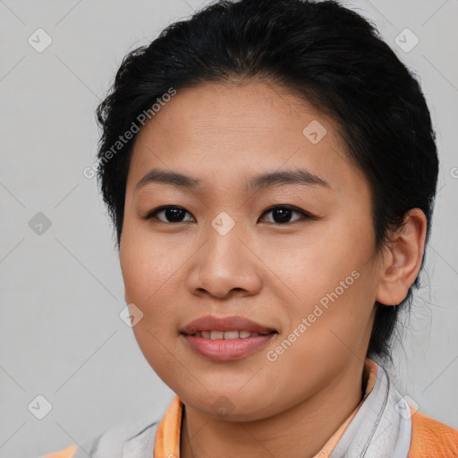 Joyful asian young-adult female with short  brown hair and brown eyes