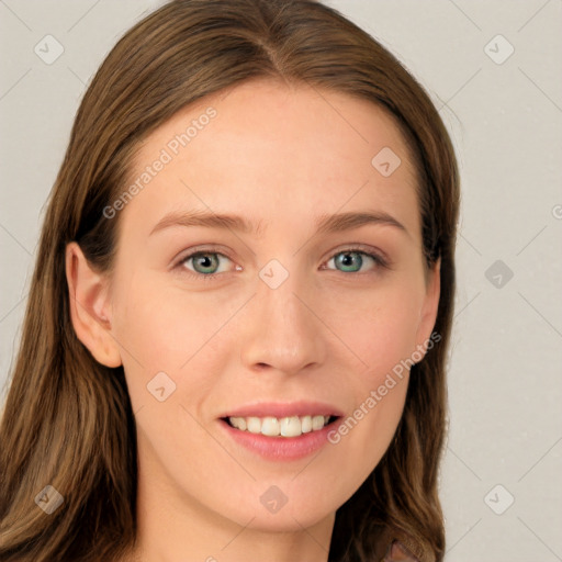 Joyful white young-adult female with long  brown hair and blue eyes