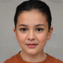 Joyful white child female with short  brown hair and brown eyes