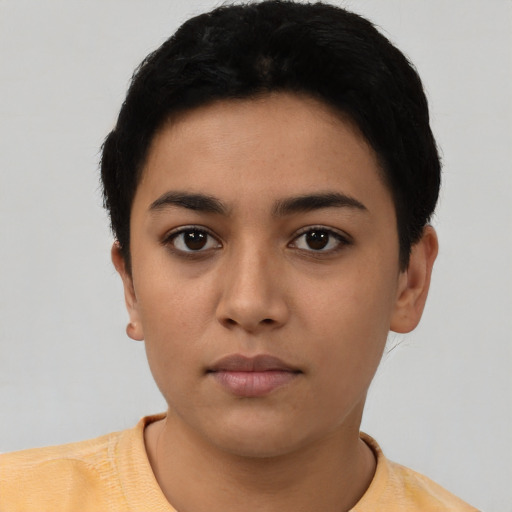 Neutral latino young-adult female with short  black hair and brown eyes