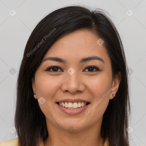 Joyful latino young-adult female with long  brown hair and brown eyes