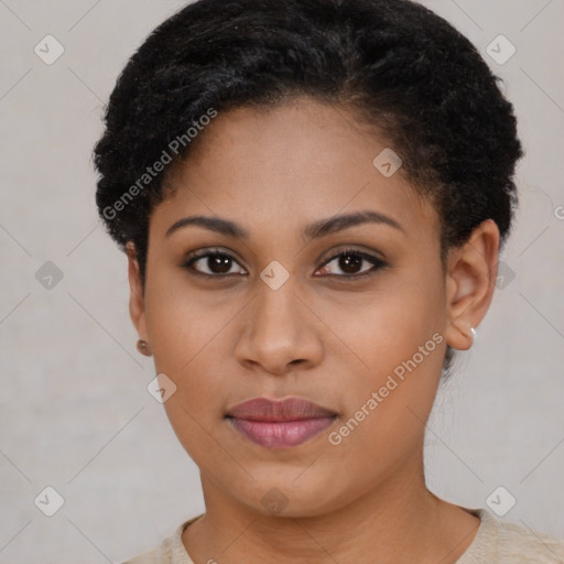 Joyful black young-adult female with short  brown hair and brown eyes