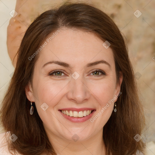 Joyful white adult female with long  brown hair and brown eyes