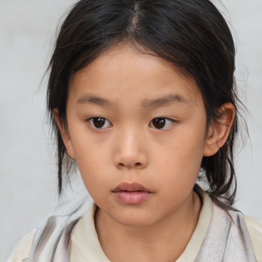 Neutral asian child female with medium  brown hair and brown eyes