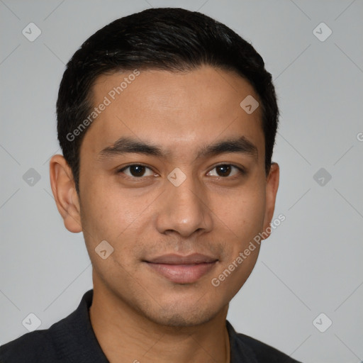 Joyful latino young-adult male with short  black hair and brown eyes