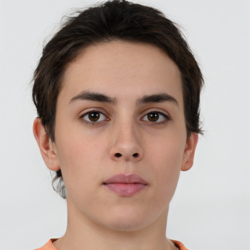 Neutral white young-adult female with short  brown hair and brown eyes