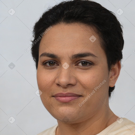 Joyful latino young-adult female with short  brown hair and brown eyes