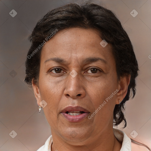 Joyful white adult female with short  brown hair and brown eyes