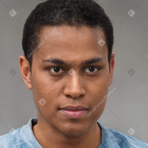 Joyful black young-adult male with short  brown hair and brown eyes