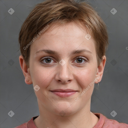 Joyful white young-adult female with short  brown hair and grey eyes