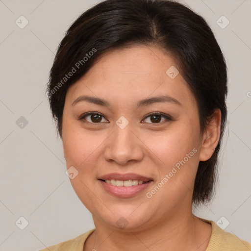 Joyful white young-adult female with medium  brown hair and brown eyes