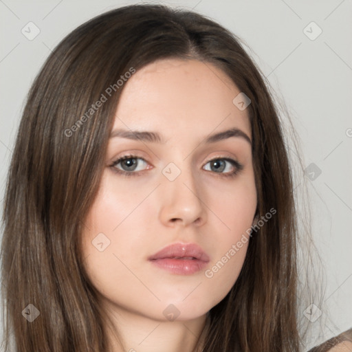 Neutral white young-adult female with long  brown hair and brown eyes