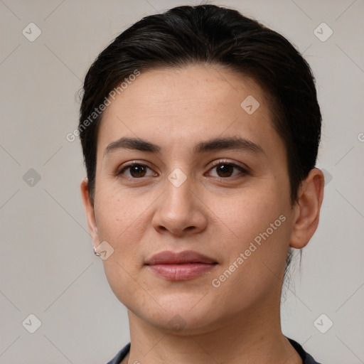 Joyful white young-adult female with short  brown hair and brown eyes