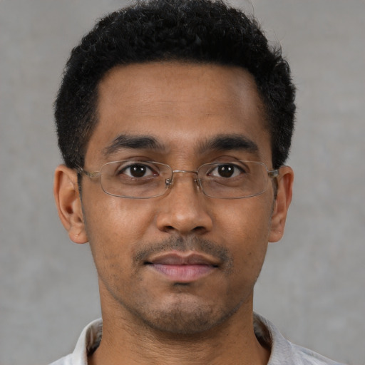 Neutral black young-adult male with short  brown hair and brown eyes