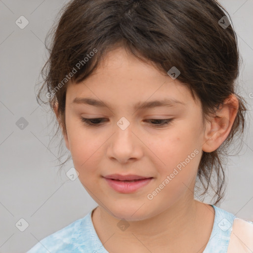 Joyful white child female with medium  brown hair and brown eyes