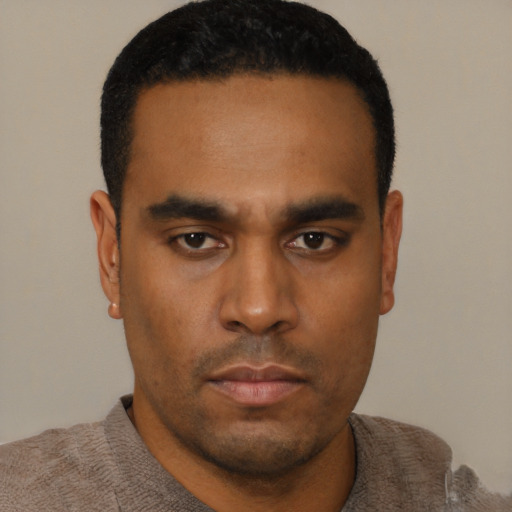 Neutral latino young-adult male with short  black hair and brown eyes