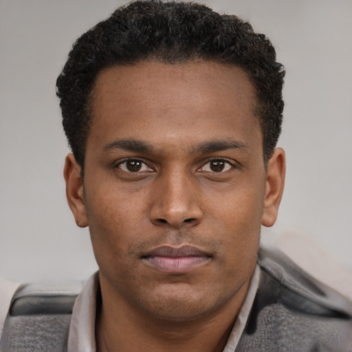 Neutral latino young-adult male with short  brown hair and brown eyes